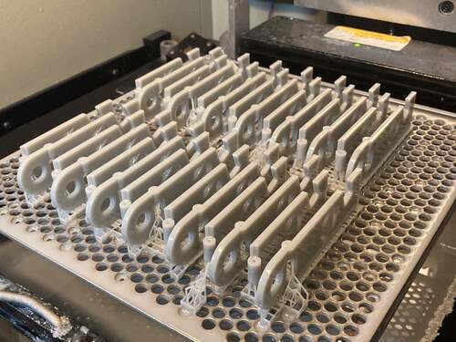 SLA phone holders AME-3D on bed-min
